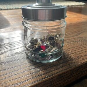 Glass Jar with Assorted Jewelry earrings